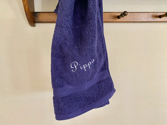 A blue soft and absorbent hand towel 16" x 27"  for the cuddling fo your pet when his paws need wiping from the rain or durt. Pet towel to carry in the car for your pets needs, a custom towel gift for the pet mom.  Borgmans Creations