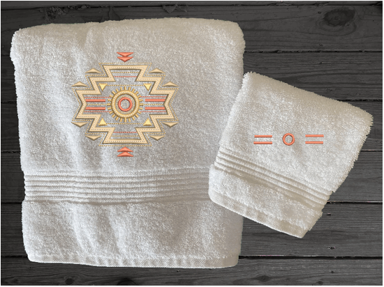 White hand towel embroidered Southwest Symbol is the perfect design for the western living family, that farmhouse decor. This Luxury western theme bath towel is 2" x 55", the washcloth is 13" x 13" Borgmanns Creations