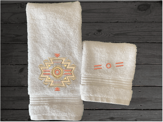 White hand washcloth towels embroidered Southwest Symbol is the perfect design for the western living family, that farmhouse decor. This Luxury western theme hand towel is 2716" x 27", the washcloth is 13" x 13" Borgmanns Creations