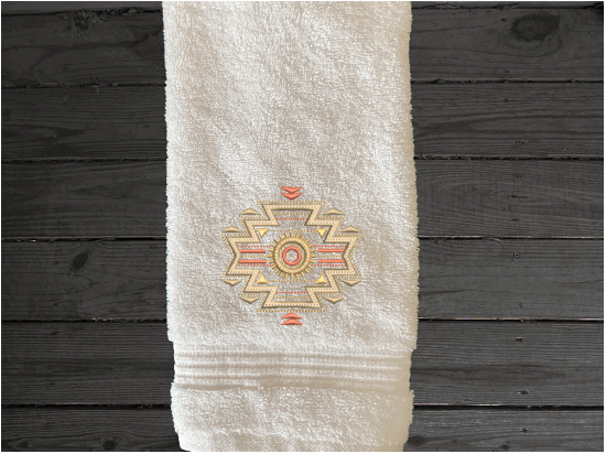 White hand towel  embroidered Southwest Symbol is the perfect design for the western living family, that farmhouse decor. This Luxury western theme hand towel is 16" x 27",  Borgmanns Creations