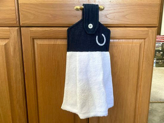 A soft and absorbing hanging bathroom/kitchen towel with button to hang on oven door or drawer handle. 16" x 9 1/2" terry towel with white denim top with batting overall leingth 17 inches. The embroidered horseshoe  showes off the western theme perfect gift for mom. Housewarming, bridal shower, anniversary, etc. Borgmanns Creations - 1