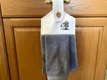 Load image into Gallery viewer, A soft and absorbing hanging bathroom/kitchen towel with button to hang on oven door or drawer handle. 16&quot; x 9 1/2&quot; terry towel with white denim top with batting overall leingth 17 inches perfect gift for mom, for her guests to use. Makes a wonderful housewarming gift, bridal shower, anniversary, Christmas, etc. Borgmanns Creations - 3
