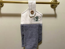 Load image into Gallery viewer, A soft and absorbing hanging bathroom/kitchen towel with button to hang on oven door or drawer handle. 16&quot; x 9 1/2&quot; terry towel with white denim top with batting overall leingth 17 inches perfect gift for mom, for her guests to use. Makes a wonderful housewarming gift, bridal shower, anniversary, Christmas, etc. Borgmanns Creations - 4
