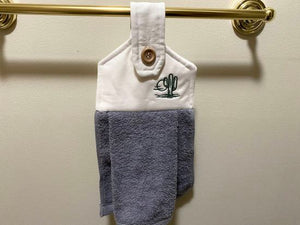 A soft and absorbing hanging bathroom/kitchen towel with button to hang on oven door or drawer handle. 16" x 9 1/2" terry towel with white denim top with batting overall leingth 17 inches perfect gift for mom, for her guests to use. Makes a wonderful housewarming gift, bridal shower, anniversary, Christmas, etc. Borgmanns Creations - 4