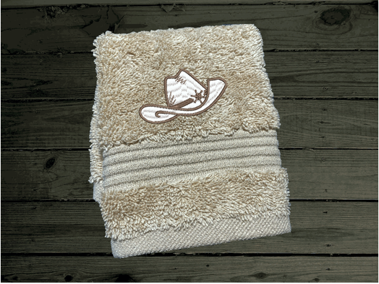 Beige western washcloth, cowboy hat, this Luxury Turkish Towel set has 3 towels  1 bath towel 27" x 50", 1 hand towel 16" x 27", 1 washcloth - 13" x 13" the perfect design for the western farmhouse decor. You can personalize this bathroom towel set will make a wonderful wedding gift.  Borgmanns Creations 