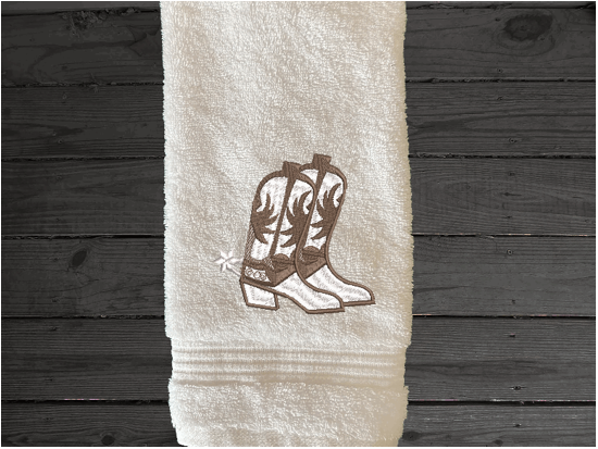 White hand towel high quality luxury Turkish towels durable soft and absorbent, finished edges with a decorative band. Set has 1 bath towel 27" x 55", 1 hand towel 16" x 27", 1 washcloth 13" x 13". Embroidered with a custom design. You can personalize the towel set with a name and an initial on the washcloth or just the designs. These luxury towels will make a wonderful wedding gift, housewarming gift, or for your own bathroom decor. Borgmanns Creation