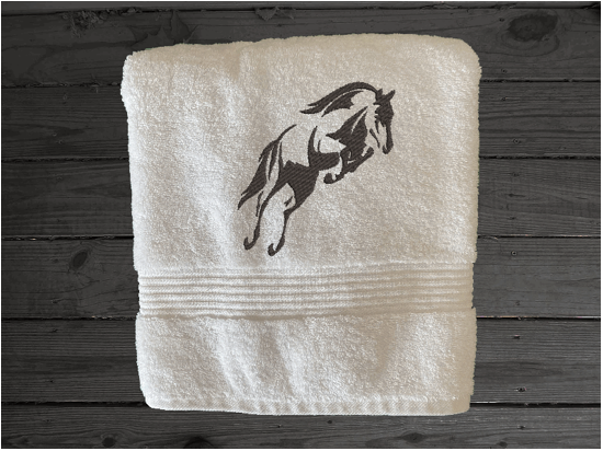 White bath towel,  embroidered jumping horse is the perfect design for the horse living family, that English decor. This Luxury horse towel set of 3 towels 1 bath towel 27' x 50", 1 hand towel16" x 27", 1 wash cloth 13" x 13". You can personalize the towel set with a name and an initial on the wash cloth or just the designs - Borgmanns Creations