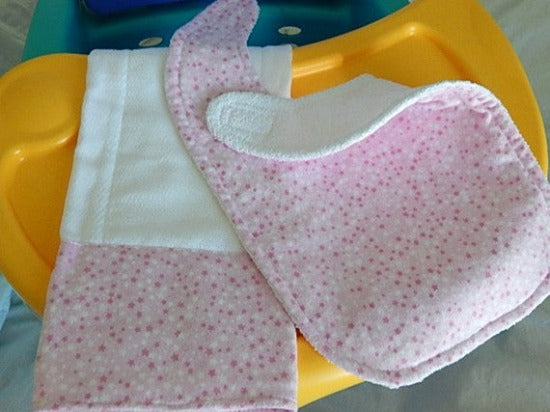 Bib and burp cloth set -pink with stars design - will make a cute gift for the new born baby shower. Made of flannel top and terry cloth backing,  bib 9" from neck to bottom- 8" wide with sticky fasteners, burp cloth is 16" x 8" to keep the baby dry from those frequent spills. Custom gift for a toddler - Borgmanns Creations - 4