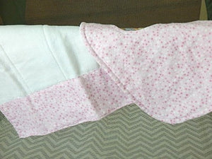 This photo showes the sticky fasteners on the bib, bib and burp cloth set -pink with stars design - will make a cute gift for the new born baby shower. Made of flannel top and terry cloth backing,  bib 9" from neck to bottom- 8" wide with sticky fasteners, burp cloth is 16" x 8" to keep the baby dry from those frequent spills. Custom gift for a toddler - Borgmanns Creations - 5