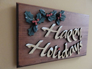 Wood wall hanging - laser cut lauan wood glued to 1" mahogany stained wood - layered wood for holly leaves - a touch of acrylic paint for snow on letters - 11 1/2" x 7 1/4" - Borgmanns Creations 