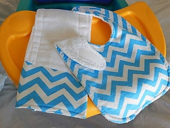 This bib and burp cloth set -blue chevron design - will make a cute gift for the new born baby shower. The bib 9" from neck to bottom- 8" wide, burp cloth- per fold diaper. Made of flannel top and terry cloth backing to keep the baby dry from those frequent spills. Custom gift for a toddler - Borgmanns Creations - 2
