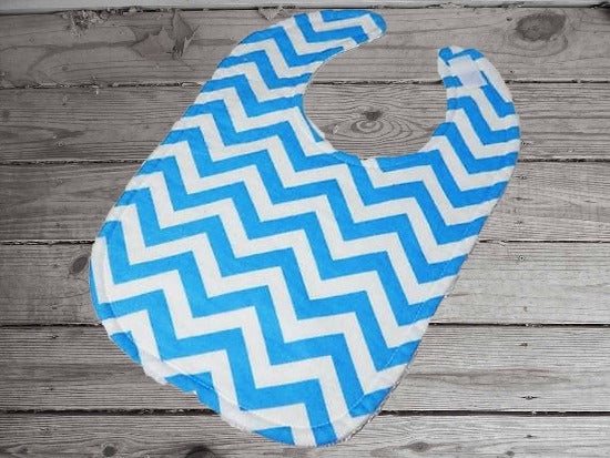 This photo showes the front of the bib for the bib and burp cloth set -blue chevron design - will make a cute gift for the new born baby shower. The bib 9" from neck to bottom- 8" wide, burp cloth- per fold diaper. Made of flannel top and terry cloth backing to keep the baby dry from those frequent spills. Custom gift for a toddler - Borgmanns Creations - 6