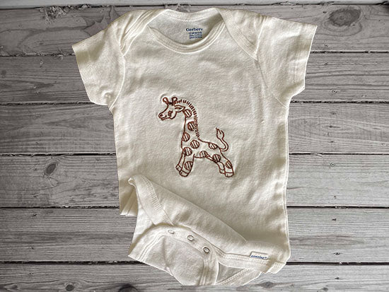 This Onesies ®, size 12 month, is white with short sleeves and an embroidered giraffe in brown just the gift you need to order for your baby shower gift. This bodysuit for new mom gift will be great for boy or girl as they grow so fast. Wonderful design for the animal nursery theme - Borgmanns Creations - 1