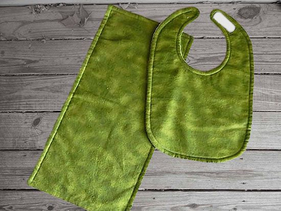 This bib and burp cloth set made of shades of green flannel top and terry cloth backing - bib 9" from neck to bottom- 8" wide with sticky fasteners, burp cloth is 16" x 8" will make a great gift for the new born baby shower, first birthday gift, etc.  To keep the baby dry from those frequent spills - Borgmanns Creations -1
