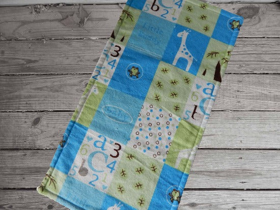 This burp cloth has  a cute aimal design is to the bib and 2 burp cloth set - will make a cute gift for the new born baby shower. Made of flannel top and terry cloth backing bib 9" from neck to bottom- 8" with sticky fasteners,  burp cloth is 16" x 8" wide,  to keep the baby dry from those frequent spills. Custom gift for a toddler - Borgmanns Creations - 4