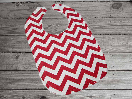This bib -red chevron design -made of flannel top and terry cloth backing, the bib 9" from neck to bottom- 8" wide with sticky fasteners, burp cloth- per fold diaper will make a cute gift for the new born baby shower to keep the baby dry from those frequent spills. Custom gift for a toddler - Borgmanns Creations - 3