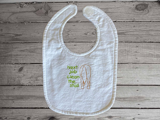 White bib with the humorous saying - Next Job Clean the Stall - embroidered horse's back side with green littering, is made of flannel top and terry cloth backing. bib 9" from neck to bottom- 8" wide with sticky fasteners, the burp cloth is 16" x 8" makes a cute gift for the new born baby shower - Borgmanns Creations - 2