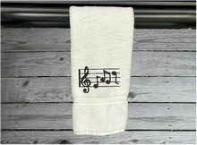 Load image into Gallery viewer, White musical notes hand towel - embroidered musical notes -  gift for mom and her music minded family - teachers band members etc. - bathroom or kitchen decor - cotton premium terry towel, soft and absorbent, 16&quot; x 27&quot; - Borgmanns Creations -2
