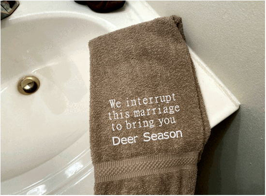 Beige Sports hand towel, deer hunter gift  -  cute embroidered saying " we interrupt this marriage to bring you deer season", - terry towel,  soft and absorbent, 16" x 27" - great gift for husband or wife - useful towel when it comes time to dressing the deer - kitchen or bath hand towel - Borgmanns Creations 