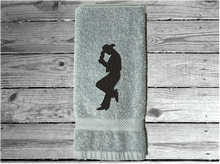 Load image into Gallery viewer, Gray hand towel - embroidered cowboy silhouette - western decor - cowgirl / cowboy gift - personalize it with their name or ranch name -  bathroom or guest bath kitchen or born work towel - Borgmanns Creations 4
