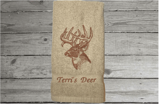 Beige Deer head hand towel, beautiful design to set off your bathroom or kitchen decor. Embroidered design on a terry towel, 16" x 27", soft and absorbent, personalized gift for the deer hunter you know, a great fall home decor towel or your deer hunter can use it when preparing the deer - 1