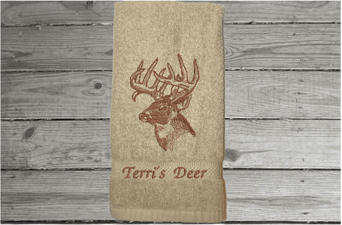Beige Deer head hand towel, beautiful design to set off your bathroom or kitchen decor. Embroidered design on a terry towel, 16