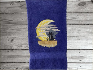 Blue hand towel, beautiful design of a cat watching the moon through the clouds, decorative towel for the bathroom or kitchen to brighten up your Halloween decor. You can personalize it for a gift to a friend or family member. The terry towel, 16" x 27", is soft and absorbent for any bathroom - Borgmanns Creations - 2