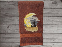 Load image into Gallery viewer, Brown hand towel, beautiful design of a cat watching the moon through the clouds, decorative towel for the bathroom or kitchen to brighten up your Halloween decor. You can personalize it for a gift to a friend or family member. The terry towel, 16&quot; x 27&quot;, is soft and absorbent for any bathroom - Borgmanns Creations - 3
