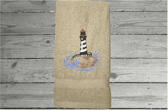 Beige Nautical hand towel - lake home decor - embroidered lighthouse on a cotton terry towel premium soft and absorbent, 16" x 27" - housewarming gift for travelers who live by the sea side or have weekend home by the water, a collector of lighthouses, Borgmanns Creations