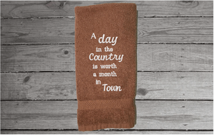 Brown hand towel - cute saying" A Day in the Country is worth a Month in Town" - picture this embroidered country hand towel in your kitchen or bath. - unique birthday gift for the farmhouse home decor - cotton terry towel premium soft and absorbent 16" x 27" - Borgmanns Creations - 3