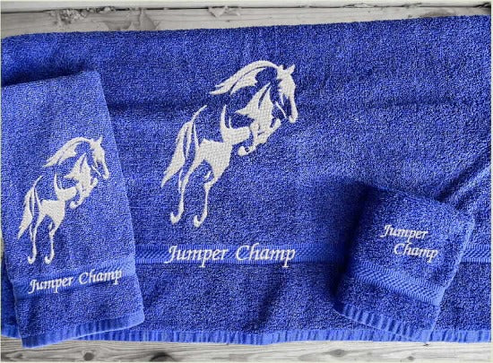 Blue bath towel set or individual towels, embroidered jumping horse is the perfect design for the horse living family, that English decor. This Luxury horse towel set of 3 towels 1 bath towel, 1 hand towel, 1 wash cloth. Personalize the towel set with a name and an initial on the wash cloth or just the designs - Borgmanns Creations - 1