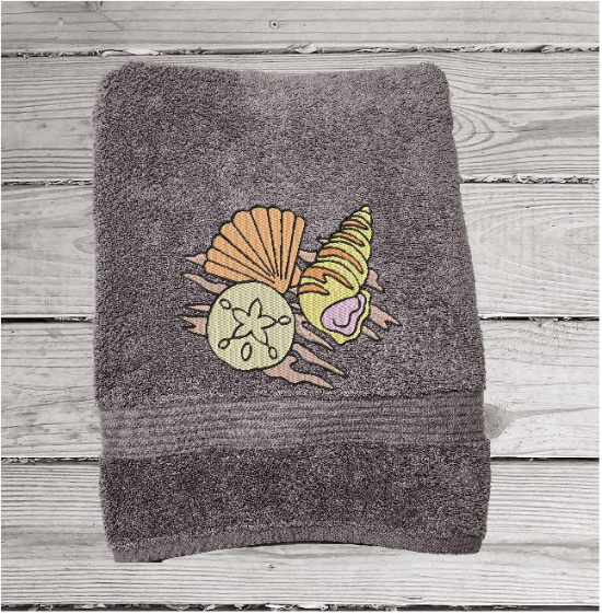 Gray bath towel with embroidered  sea shells is 15" x 55"  can be purchased with a hand and washcloth as a set. Personalized bathroom lake decor wonderful towel set for your home decor, housewarming gift or wedding gift. Borgmanns Creations 2