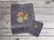 Load image into Gallery viewer, Gray bath towel 15&quot; x 55&quot; with washcloth 13&quot; x 13&quot; embroidered sea shells is can be purchased with a hand towel as a set. Personalized bathroom lake decor wonderful towel set for your home decor, housewarming gift or wedding gift. Borgmanns Creations 3

