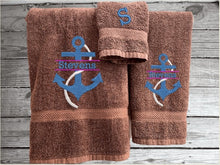 Load image into Gallery viewer, Brown bath towel set or individual towels, personalized name on anchor. This Luxury towel set of 3 towels 1 bath towel 27&quot; x 50&quot;,1 hand towel 16&quot; x 27&quot;, 1 washcloth 13&quot; x 13&quot;. Perfect design for your home, lake home or as a gift for a friend. Premium soft and absorbent towels make a wonderful home decor gift for a friend.  - Borgmanns Creations - 1
