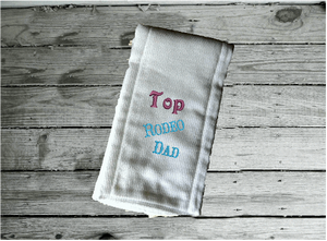Bib burp cloth set embroidered Rodeo Dad design - baby shower gift farmhouse decor - wonderful gift set for a new born or toddler - Bib has flannel top with terry backing is 13" in over all length, 7 1/4" from neck to bottom and 8 3/4" at widest point - sticky fasteners - burp cloth is tri fold diaper - Borgmanns Creations 3