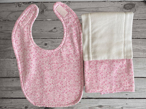 This bib and burp cloth set -pink with stars design - will make a cute gift for the new born baby shower. Made of flannel top and terry cloth backing,  bib 9