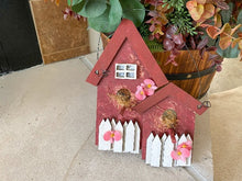 Load image into Gallery viewer, Double birdhouse wall hanging - gift for the bird lover to decorate their home. - red birdhouse white picked fence. - laser cut luan wood layered for a 3D look, material in window, flowers and wire hanger - 10&quot; H x 8&quot; W x 1 1/2 D. unique house warming gift or birthday gift - home decor farmhouse decor - Borgmanns Creations
