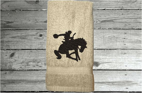 Beige Bath hand towel - silhouette bronc and rider - western rodeo ranch decor - work towel - horse lover gift - kitchen, bath or bar decor - home decor - birthday gift for him - Borgmanns Creations