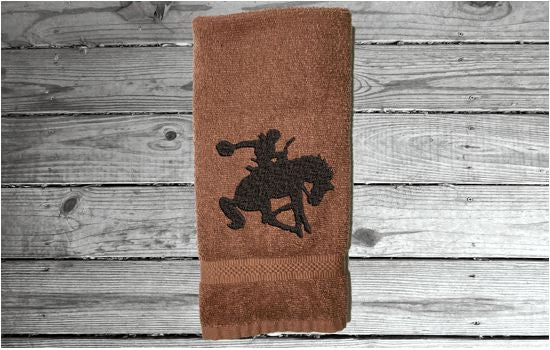 Brown Bath hand towel - silhouette bronc and rider - western rodeo ranch decor - work towel - horse lover gift - kitchen, bath or bar decor - home decor - birthday gift for him - Borgmanns Creations