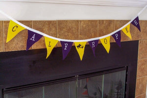 Calf roper banner - decorate your wall to show off your trophies - party decorations - celebrate your last go round - kids room - letters are embroidered so they can't peel off - 10 flags each 3 1/2" x 4 1/2" soft felt sewn to bias tape, - embroidered letters - roper on the center flag - Borgmanns Creations - 2