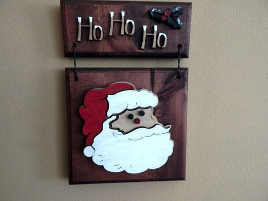 Santa Face wall hanging - Christmas decor gift for mom - wood wall plaque - laser cut lauan wood glued to a 1" beveled edge wood with mahogany stain, hanging hook on back - housewarming gift teacher gift gift for a coworker  - 11" x 7" - Borgmanns Creations