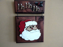 Load image into Gallery viewer, Santa Face wall hanging - Christmas decor gift for mom - wood wall plaque - laser cut lauan wood glued to a 1&quot; beveled edge wood with mahogany stain, hanging hook on back - housewarming gift teacher gift gift for a coworker  - 11&quot; x 7&quot; - Borgmanns Creations
