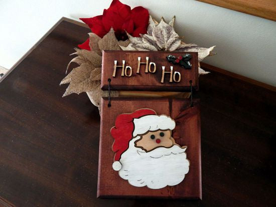Santa Face wall hanging - Christmas decor gift for mom - wood wall plaque - laser cut lauan wood glued to a 1" beveled edge wood with mahogany stain, hanging hook on back - housewarming gift teacher gift gift for a coworker - 11" x 7" - Borgmanns Creations