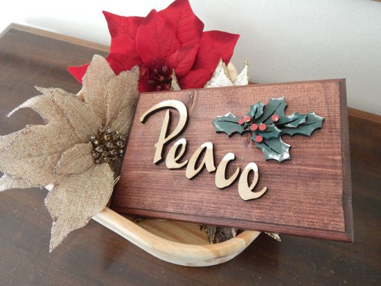 Peace wall hanging - Christmas decor gift for mom - wood wall plaque - laser cut lauan wood glued to a 1" beveled edge wood with mahogany stain - hanging hook on back - 8 1/2"H x 5 1/2" W x 1 1/2"D - housewarming gift teacher gift coworker gift - Borgmanns Creations