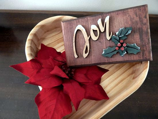 Joy wall hanging - home decor - holiday season - wall plaque laser cut lauan wood glued to a 1" beveled edge mahogany stained wood - hanging hook on back - great holiday gift best friend - family gift - 7 1/4" x 4 1//2" - Borgmanns Creations
