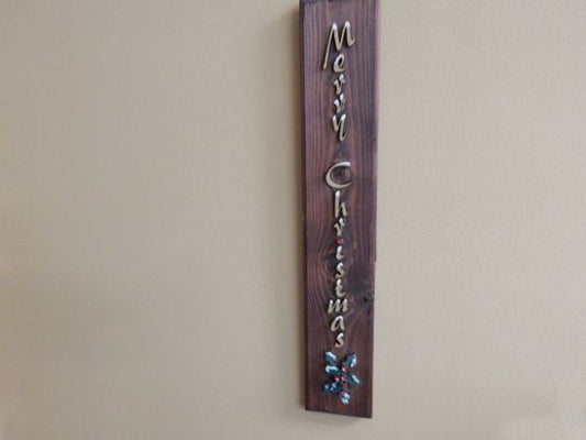 Merry Christmas sign - wall hanging Holiday decor - gift for mom - laser cut lauan wood glued to a 1" beveled edge mahogany stained base - hook on back - laser wood art - hung or stand at floor level - 20" x 3 1/2" - Borgmanns Creations