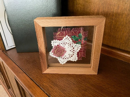 Crochet doily art - Christmas material for accent - Christmas gift farmhouse decoration -gift for mom, grandma, or aunt - shelf sitter or hang by frame - doily between 2 pieces of acrylic framed in 1