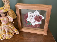 Load image into Gallery viewer, Crochet doily art - Christmas material for accent - Christmas gift farmhouse decoration -gift for mom, grandma, or aunt - shelf sitter or hang by frame - doily between 2 pieces of acrylic framed in 1&quot; wood, 7&quot; x 7&quot; - Borgmanns Creations 4
