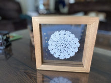 Load image into Gallery viewer, Crochet doily in frame - one of a kind wall hanging, or it can stand alone on any side - gift for the country farmhouse home decor - bedroom decor ideas for your home or a special gift - the doily is between 2 pieces of acrylic and framed in wood. 7&quot; H x 7&quot; W x 1 1/4&quot; D - Borgmanns Creations - 3
