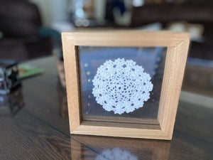 Crochet doily in frame - one of a kind wall hanging, or it can stand alone on any side - gift for the country farmhouse home decor - bedroom decor ideas for your home or a special gift - the doily is between 2 pieces of acrylic and framed in wood. 7" H x 7" W x 1 1/4" D - Borgmanns Creations - 3